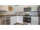 Contemporary kitchen with stainless steel appliances, ample counter space, and sleek cabinets for an efficient cooking area at 416 Mistflower Ln, Moncks Corner, SC 29461