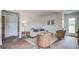Comfortable living room with hardwood style floors, a stylish area rug, and neutral paint at 416 Mistflower Ln, Moncks Corner, SC 29461