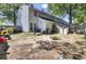 Large, shaded backyard with a fence, shed, and plenty of space for outdoor activities at 4662 Nibbs Ln, North Charleston, SC 29418