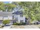 Charming two-story townhouse with a balcony, well-maintained landscaping, and ample parking at 4662 Nibbs Ln, North Charleston, SC 29418
