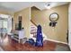 Hallway leads to stairs and a peek into another room at 4662 Nibbs Ln, North Charleston, SC 29418