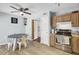 Bright kitchen features stainless steel appliances and wood-look flooring, great for cooking at 4662 Nibbs Ln, North Charleston, SC 29418