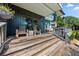Inviting deck features wood floors, cozy seating, and scenic outdoor views at 4943 Green Dolphin Way, Kiawah Island, SC 29455