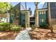 Exterior view of modern condo building with natural landscaping at 4943 Green Dolphin Way, Kiawah Island, SC 29455