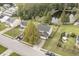 Aerial view of a home with a private backyard, pond, and mature trees in a quiet neighborhood at 4987 Ballantine Dr, Summerville, SC 29485