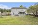 Large backyard featuring a screened porch, a patio, and a playset at 4987 Ballantine Dr, Summerville, SC 29485
