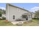 Back of home featuring a cozy screened porch and an open patio at 4987 Ballantine Dr, Summerville, SC 29485