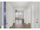Bright foyer with hardwood floors leading to an open living space, enhancing the home's appeal at 5040 Thornton Dr, Summerville, SC 29485