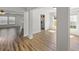 Spacious living area with hardwood flooring, natural light, and an open layout at 5040 Thornton Dr, Summerville, SC 29485