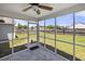 Relaxing screened porch overlooking the spacious backyard, providing an inviting outdoor space at 5040 Thornton Dr, Summerville, SC 29485