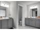Bathroom featuring double sinks, and a view to the toilet and shower rooms at 523 Kilarney Rd, Summerville, SC 29483