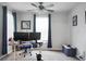 Bedroom with a ceiling fan and bright natural light, perfect for a functional home office at 523 Kilarney Rd, Summerville, SC 29483
