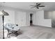Bonus room featuring neutral carpeting, ceiling fan, and ample storage with closet space at 523 Kilarney Rd, Summerville, SC 29483