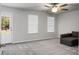 Bonus room featuring neutral carpeting, a modern ceiling fan, and a private doorway at 523 Kilarney Rd, Summerville, SC 29483