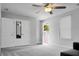 Bonus room with carpeting, a ceiling fan, closet doors, and a private doorway leading to the deck at 523 Kilarney Rd, Summerville, SC 29483