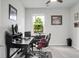 Well-lit home office with a large window and comfortable desk setup, perfect for remote work or studying at 523 Kilarney Rd, Summerville, SC 29483
