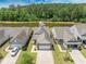 An aerial view of the house, showing the lake and fountain behind the house at 548 Sea Foam St, Summerville, SC 29486