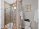 Bathroom featuring tiled walk-in shower, toilet and art at 548 Sea Foam St, Summerville, SC 29486