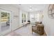 Sun room with outdoor views, seating, and lots of natural light at 548 Sea Foam St, Summerville, SC 29486