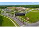 An aerial view of Roper St Francis Berkeley Hospital, a brick facade with parking lots and lush landscaping at 627 Chigwell Springs Ln, Summerville, SC 29486