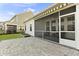 The backyard features a patio and screened in porch. A perfect space for entertaining or relaxing! at 627 Chigwell Springs Ln, Summerville, SC 29486