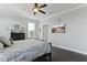 This bedroom features a ceiling fan and a mounted television for easy viewing at 627 Chigwell Springs Ln, Summerville, SC 29486
