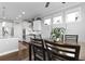 The dining room features a modern design and is adjacent to the kitchen at 627 Chigwell Springs Ln, Summerville, SC 29486