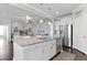 Spacious kitchen featuring a large island, stainless steel appliances, and an open layout to the living area at 627 Chigwell Springs Ln, Summerville, SC 29486