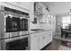Modern kitchen featuring stainless steel appliances, double oven, granite countertops, and open design at 627 Chigwell Springs Ln, Summerville, SC 29486