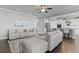 Open-concept living area blending seamlessly with a modern kitchen at 627 Chigwell Springs Ln, Summerville, SC 29486