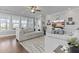 Spacious living room with abundant natural light and elegant decor at 627 Chigwell Springs Ln, Summerville, SC 29486