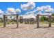 Community playground with swings and play structures, offering fun for children of all ages at 627 Chigwell Springs Ln, Summerville, SC 29486