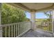 Inviting balcony features white railings and tranquil marsh views, perfect for outdoor relaxation at 700 Daniel Ellis Dr # 11302, Charleston, SC 29412