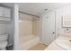 Bathroom with a tub, vanity, and tiled walls at 700 Daniel Ellis Dr # 11302, Charleston, SC 29412