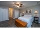 A second view of the inviting bedroom with a modern ceiling fan and newer luxury vinyl plank flooring at 717 Temple Road # B, Ladson, SC 29456