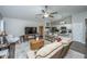Bright living room open to the kitchen with modern finishes, vaulted ceiling and hard surface floors at 717 Temple Road # B, Ladson, SC 29456