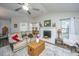 Comfortable living room with vaulted ceiling, fireplace, and a ceiling fan at 717 Temple Road # B, Ladson, SC 29456