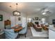 This open concept is great for entertaining; dining flows into the living area at 717 Temple Road # B, Ladson, SC 29456