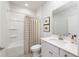 Clean bathroom with a shower-tub combo, a single sink vanity, and neutral decor providing a calming space at 744 Meadowbrook Ln, Summerville, SC 29486