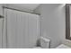 This clean bathroom features a shower with shower curtain for privacy at 7838 Long Shadow Ln, North Charleston, SC 29406