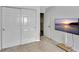 Bright bedroom featuring a large closet, neutral carpet, and flatscreen TV at 7838 Long Shadow Ln, North Charleston, SC 29406
