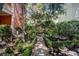 Backyard featuring a stone path, garden, and plenty of shade at 82 Ponsbury Rd, Mount Pleasant, SC 29464