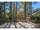 Home with a backyard gate and lush greenery at 82 Ponsbury Rd, Mount Pleasant, SC 29464