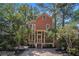 Charming two-story home with a brick path and screened porch at 82 Ponsbury Rd, Mount Pleasant, SC 29464