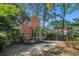 Charming two-story home with manicured front yard and screened porch at 82 Ponsbury Rd, Mount Pleasant, SC 29464