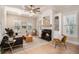 Bright living room with coffered ceilings, a fireplace, and hardwood floors at 82 Ponsbury Rd, Mount Pleasant, SC 29464