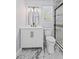 Updated bathroom featuring a vanity, toilet, glass shower, and elegant marble-look tile flooring at 867 Colony Dr # F92, Charleston, SC 29407