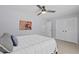 Bedroom featuring a comfortable bed, ceiling fan, closet, and view into the Primary bathroom at 867 Colony Dr # F92, Charleston, SC 29407