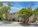 Exterior of a multi-Gathering building with brick facade, mature trees, and an asphalt parking lot at 867 Colony Dr # F92, Charleston, SC 29407