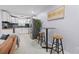 Modern kitchen featuring white cabinets, stainless steel appliances, and a breakfast bar at 867 Colony Dr # F92, Charleston, SC 29407